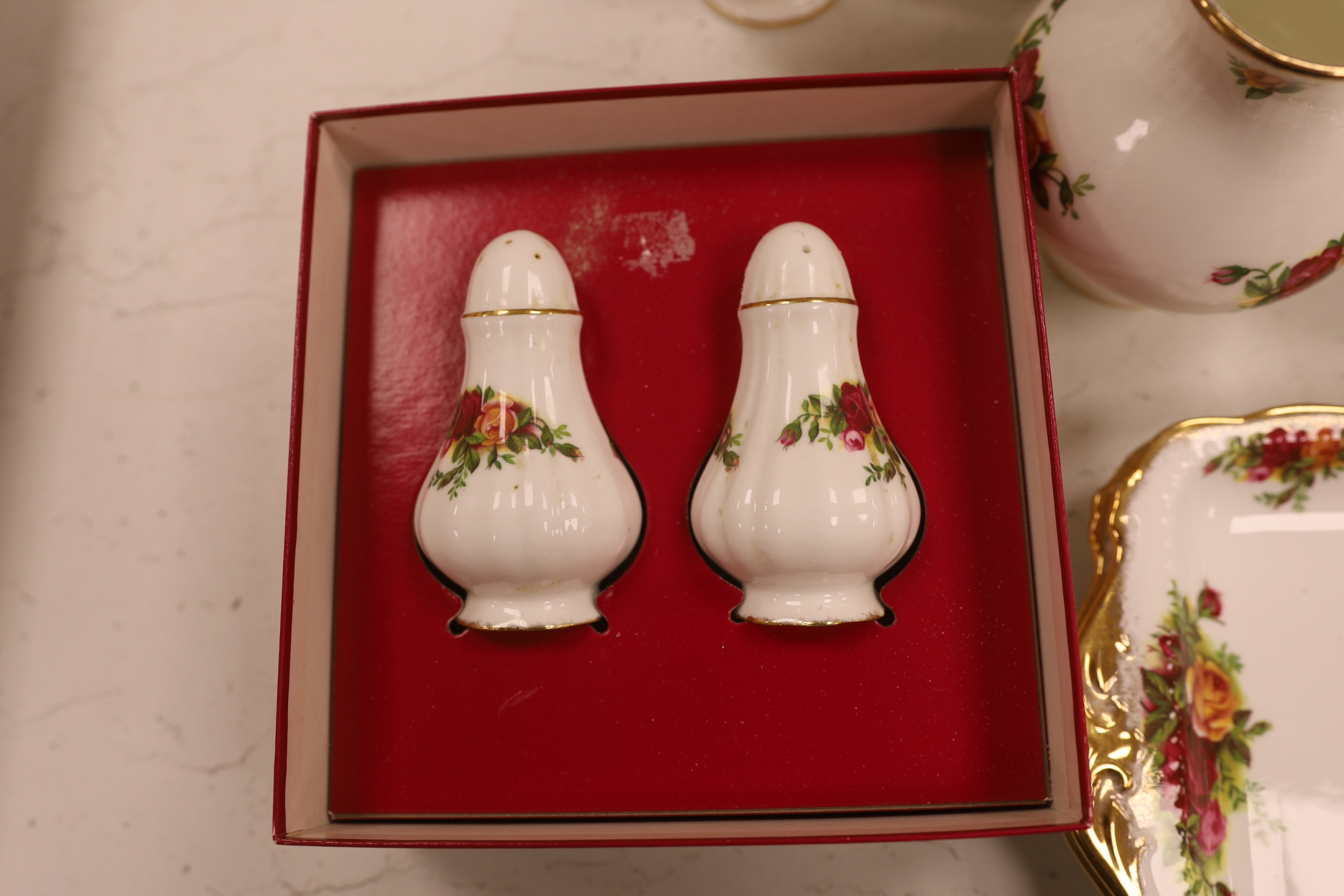 A Royal Albert Old Crown Roses dinner and tea service and a Doulton Lambeth vase